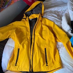 Yellow port authority rain jacket double layered 100% polyester w poly. lining